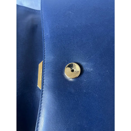 Navy leather bag with gold hardware