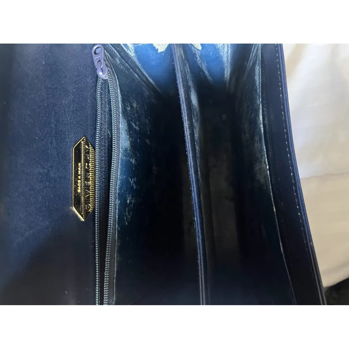 Navy leather bag with gold hardware