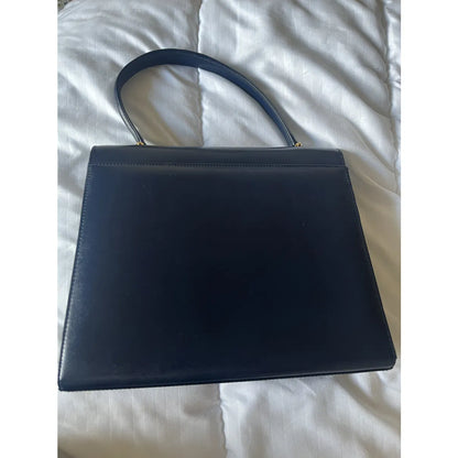 Navy leather bag with gold hardware