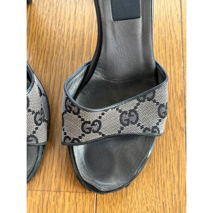 Black and grey denim mules