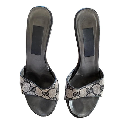 Black denim mules