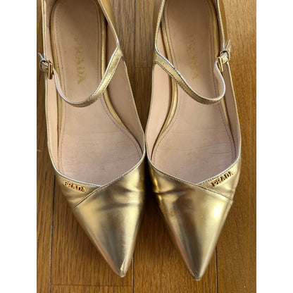 Gold leather ballet flats
