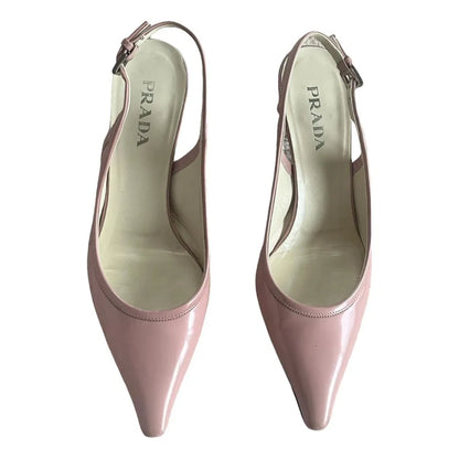 Pointed mules in baby pink