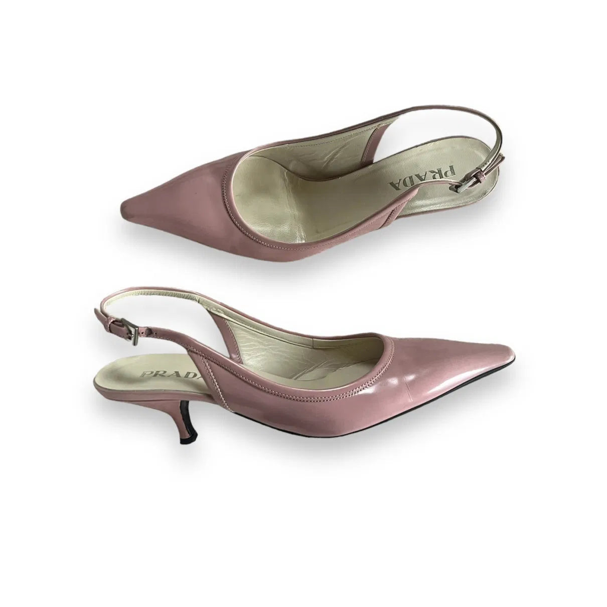 Pointed mules in baby pink
