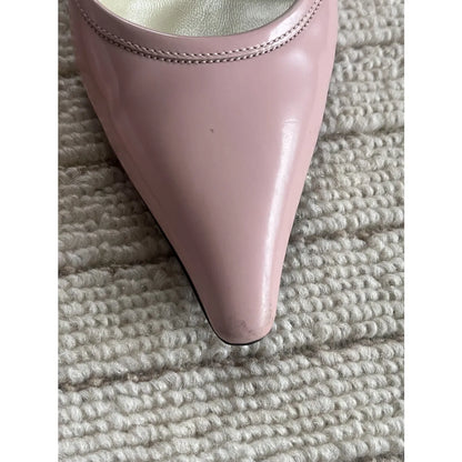 Pointed mules in baby pink