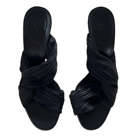 Twisted satin mules in black