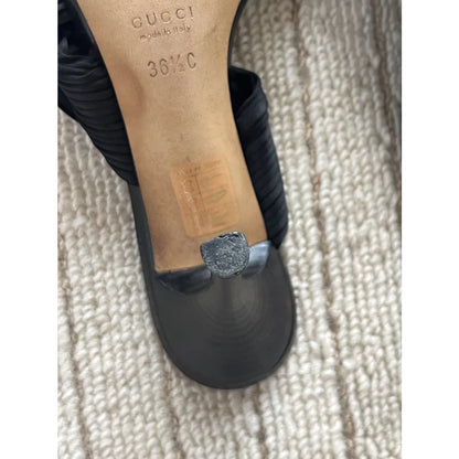 Twisted satin mules in black