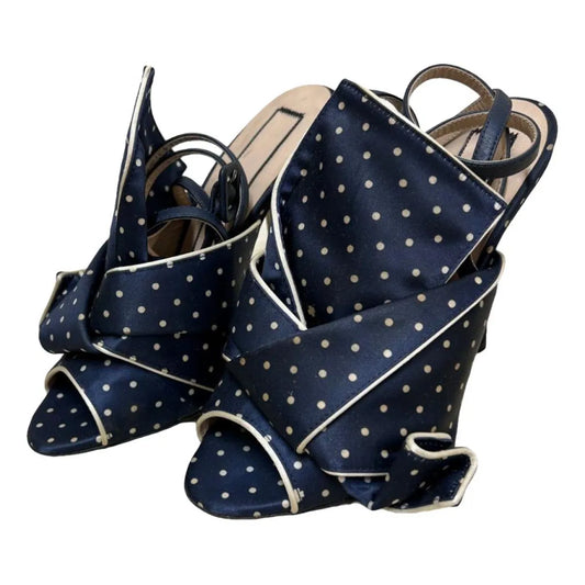 Polka dot mules in navy