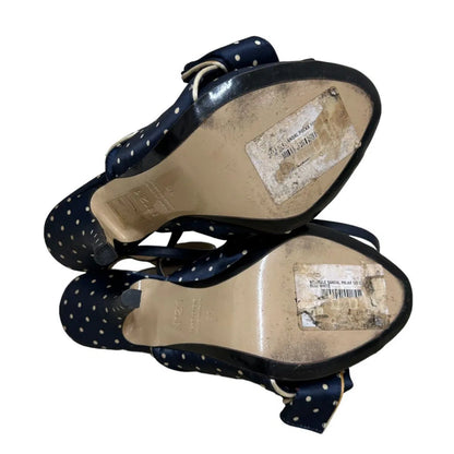 Polka dot mules in navy