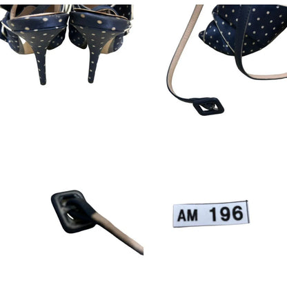Polka dot mules in navy