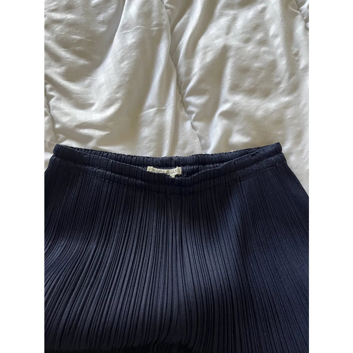 Pleated trousers in navy