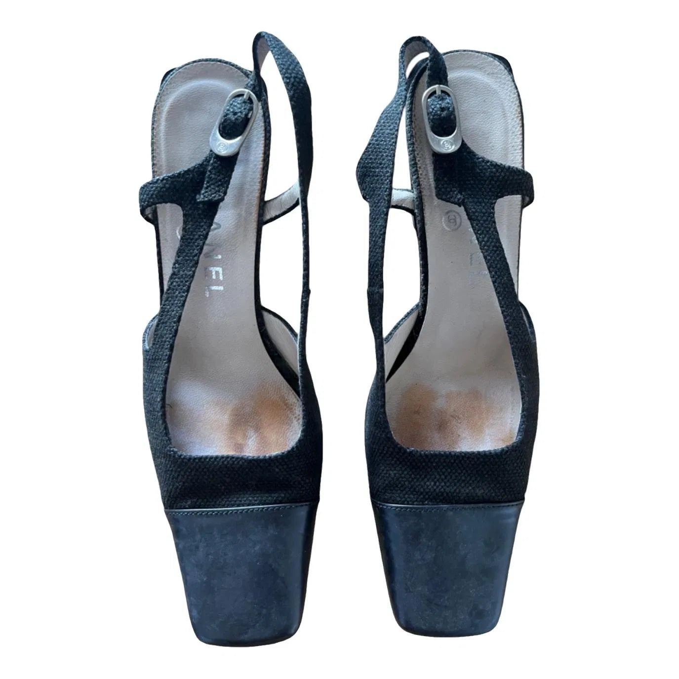 Slingback mules in black leather