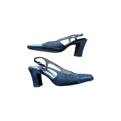 Slingback mules in black leather