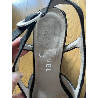 Slingback mules in black leather