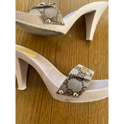 Monogram denim mules in brown