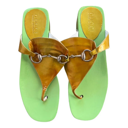 Thong sandals in green and gold